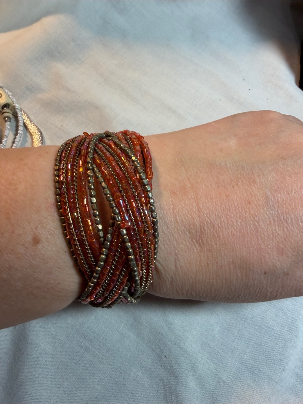 Multi-Strand Orange Bead Wrap Bracelet with Metallic Accents